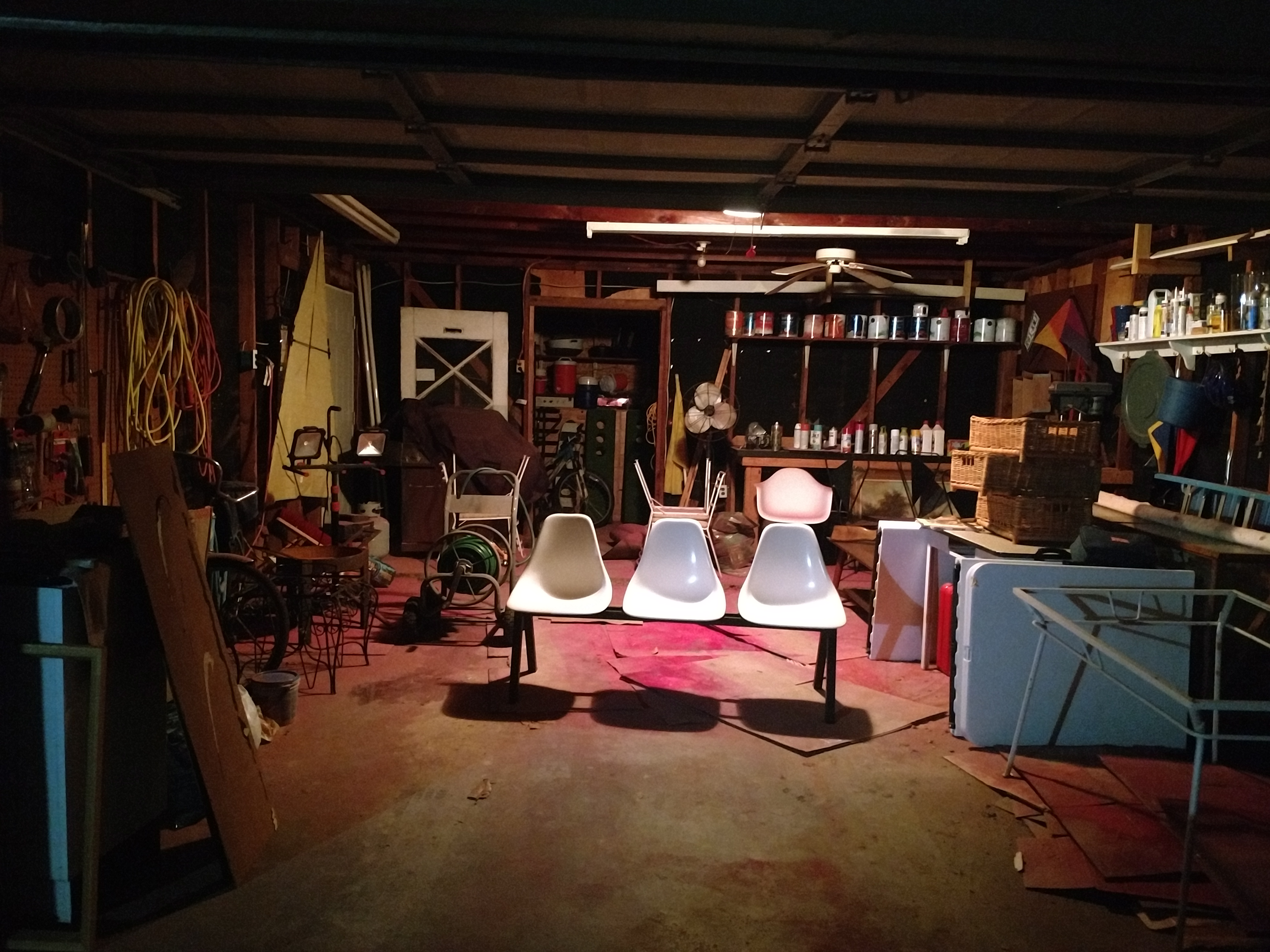 Friends garage at night with overhead lighting
