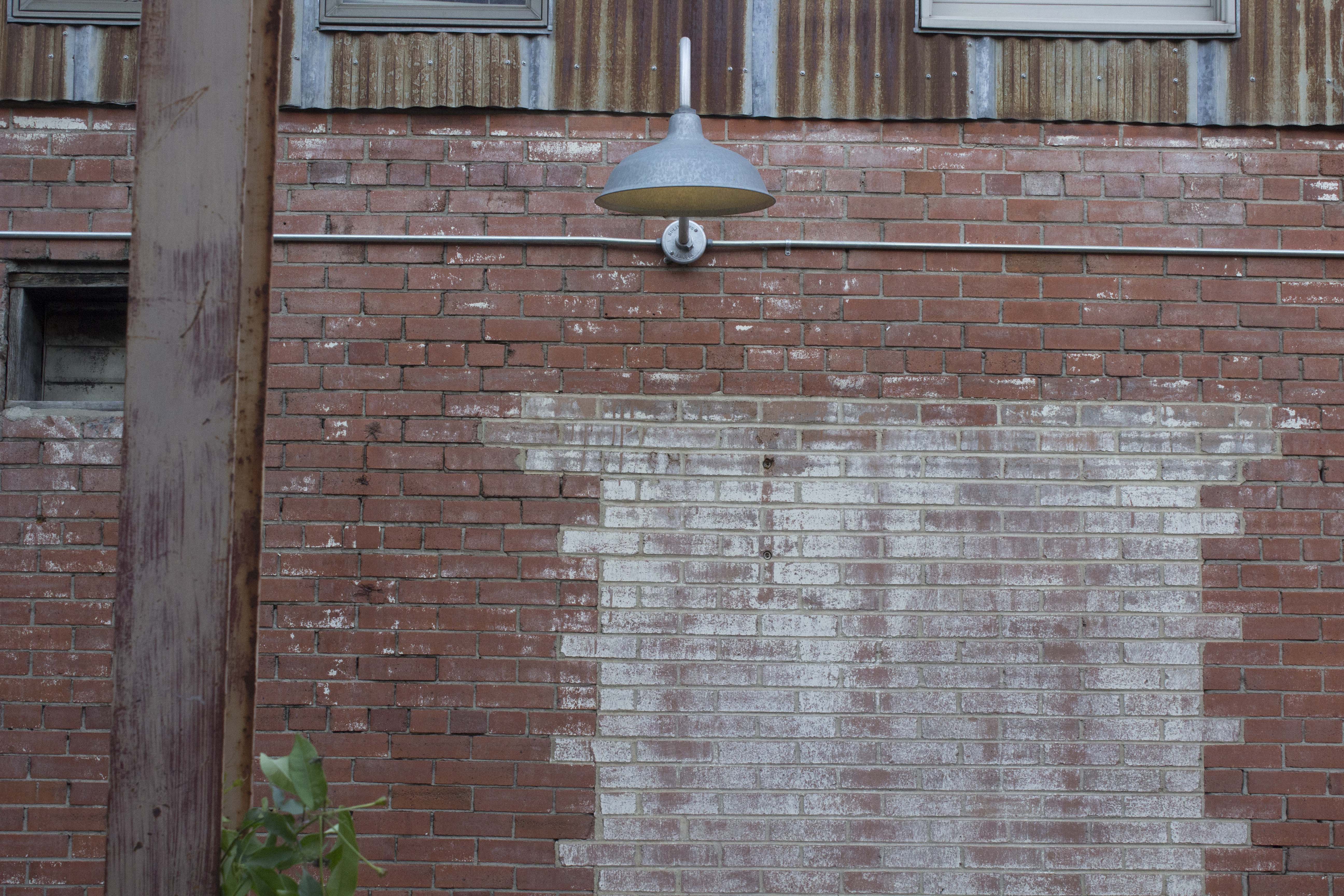 Interesting wear on brick wall